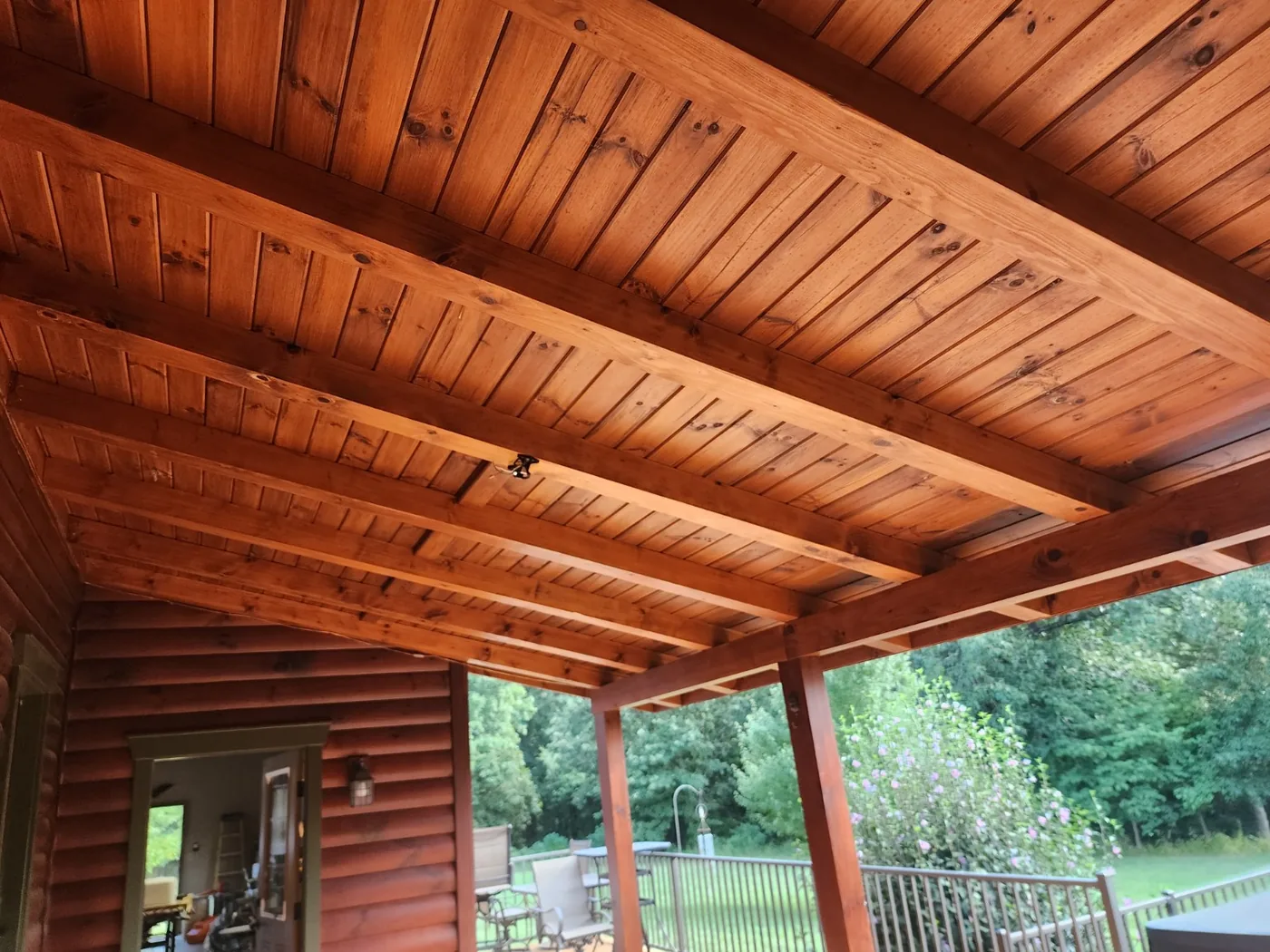 After cleaning: refreshed wood porch ceiling